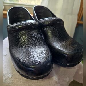 Dansko XP 2.0 Black Floral Embossed Leather Clogs